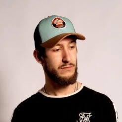 Woed | Robson - Trucker Cap - Beige - Blauw - Kurk - One Size 11 Woed | Robson - Trucker Cap - Beige - Blauw - Kurk - One Size -Liora Luxe Winkel 1200x1200 664